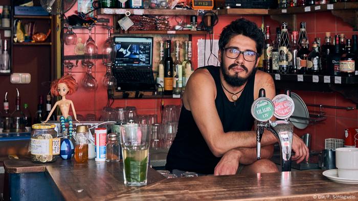 The owner of the bar Miki Karpat in his establishment in Budapest The owner of the bar Miki Karpat in his establishment in Budapest
