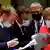 Angela Merkel, Emmanuel Macron i & razmatraju tačke dogovora