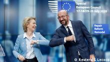 European Council President Charles Michel and European Commission President Ursula Von Der Leyen do an elbow bump at the end of a news conference following a four-day European summit at the European Council in Brussels, Belgium, July 21, 2020. Stephanie Lecocq/Pool via REUTERS TPX IMAGES OF THE DAY