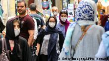 July 14, 2020***
Iranians, some wearing protective gear amid the COVID-19 pandemic, shop at the Tajrish Bazaar market in the capital Tehran on July 14, 2020. (Photo by ATTA KENARE / AFP) (Photo by ATTA KENARE/AFP via Getty Images)