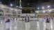 Men burn incense as Muslim a small number of pilgrims circumambulate the Kaaba Men burn incense as Muslim a small number of pilgrims circumambulate the Kaaba