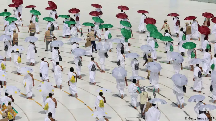 Pilgrims circumambulating around the Kaaba, Islam's holiest shrine, at the centre of the Grand Mosque in the holy city of Mecca