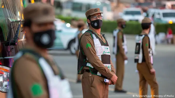 Security officers wear protective masks 
