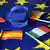 Illustration | Eurozeichen auf EU-Fahne mit den Fahnen von Spanien, Italien, Frankreich und Deutschland