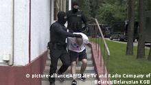 29.07.2020
In this photo taken from video released by Belarusian KGB, State TV and Radio Company of Belarus on Wednesday, July 29, 2020, a Belarusian KGB officer detains a Russian man in a sanitarium outside in Minsk, Belarus. Belarusian officials said that more than 30 detained employees of private Russian military contractor Wagner are facing a criminal probe on charges of plotting terror attacks in Belarus amid a presidential election campaign. (Belarusian KGB, State TV and Radio Company of Belarus via AP) |