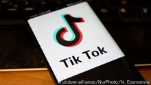 TikTok closeup logo displayed on a phone screen, smartphone and keyboard are seen in this multiple exposure illustration. Tik Tok is a Chinese video-sharing social networking service owned by a Beijing based internet technology company, ByteDance. It is used to create short dance, lip-sync, comedy and talent videos. ByteDance launched TikTok app for iOS and Android in 2017 and earlier in September 2016 Douyin fror the market in China. TikTok became the most downloaded app in the US in October 2018. President of the USA Donald Trump is threatening and planning to ban the popular video sharing app TikTok from the US because of the security risk. Thessaloniki, Greece - August 1, 2020 (Photo by Nicolas Economou/NurPhoto) | Keine Weitergabe an Wiederverkäufer.