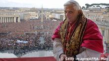VATICAN CITY, Vatican: Pope Benedict XVI, Cardinal Joseph Ratzinger of Germany, appears on the balcony of St Peter's Basilica in the Vatican after being elected by the conclave of cardinals, 19 April 2005. AFP PHOTO POOL Osservatore Romano Arturo Mari (Photo credit should read ARTURO MARI/AFP via Getty Images)