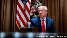 WASHINGTON, DC - AUGUST 03: U.S. President Donald Trump makes remarks as he meets with U.S. Tech Workers and signs an Executive Order on Hiring Americans, in the Cabinet Room of the White House on August 3, 2020 in Washington, DC. The executive order bans federal agencies from firing American citizens or green card holders and hiring foreign workers to do their jobs. (Photo by Doug Mills-Pool/Getty Images)