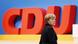 Kanzlerin Merkel vor CDU-Logo Kanzlerin Merkel vor CDU-Logo