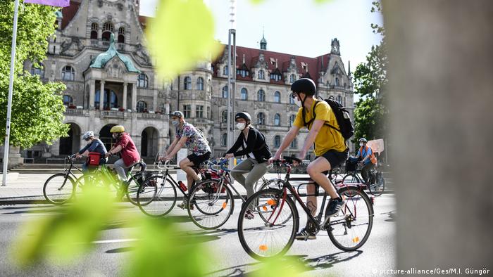 People ride bikes side by side in Hamburg