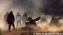Serbian soldiers fire from mountain howitzers on February 09, 1993 on Obrovac heights Croatian targets. Obrovac is 70 kms from Knin, the capital of the Krajina Serb-held Krajina region. UN cease-fire Between Croatians and Serbian forces was arranged on January 2, 1992. The UN Security Council in February approved sending a 14,000-member peace-keeping force to monitor the agreement and protect the minority Serbs in Croatia. In a 1993 referendum, the Serb-occupied portion of Croatia (Krajina) resoundingly voted for integration with Serbs in Bosnia and Serbia proper. Although the Zagreb government and representatives of Krajina signed a cease-fire in March 1994, further negotiations broke down. In a lightning-quick operation, the Croatian army retook western Slavonia in May 1995. Similarly, in August, the central Croatian region of Krajina, held by Serbs, was returned to Zagreb's control. AFP PHOTO GABRIEL BOUYS (Photo credit should read GABRIEL BOUYS/AFP via Getty Images)