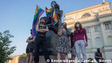 LGBT supporters protest in Warsaw, Poland August 7, 2020. A Polish LGBT+ protestor could be jailed for hanging rainbow flags on statues in the capital, Warsaw, her lawyer said on Thursday, as gay rights divide the eastern European country. Adam Stepien/Agencja Gazeta via REUTERS ATTENTION EDITORS - THIS IMAGE WAS PROVIDED BY A THIRD PARTY. POLAND OUT. NO COMMERCIAL OR EDITORIAL SALES IN POLAND.