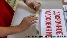 MINSK, BELARUS - AUGUST 8, 2020: A woman casts her ballot into a ballot box at a polling station during an early voting in the 2020 Belarusian presidential election which is held on 4-8 August. The 2020 Belarusian presidential election is scheduled for 9 August. Valery Sharifulin/TASS PUBLICATIONxINxGERxAUTxONLY TS0E2A91
