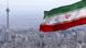 Iran's national flag flies over the skyline of Tehran Iran's national flag flies over the skyline of Tehran