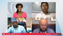 A screenshot of the Global Media Forum 2020 digital panel showing (clockwise from top left) Elizabeth Shoo, DW; Brang Mai, Myitkyina News Journal; David Schraven, Correctiv; and Nasir Salisu Zango, Freedom Radio.