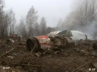 This image from Polish Television's TVP via APTN shows a firefighter walking near some of the wreckage at the crash site where Polish President Lech Kaczynski, his wife and some of the country's most prominent military and civilian leaders died Saturday April 10, 2010
