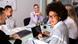 A black women participates in a business meeting at work A black women participates in a business meeting at work