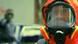 Film still Phase 7, a man wearing a protective helmet Film still Phase 7, a man wearing a protective helmet