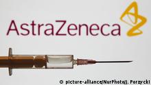 Medical syringe is seen with AstraZeneca company logo displayed on a screen in the background in this illustration photo taken in Poland on June 16, 2020. (Photo Illustration by Jakub Porzycki/NurPhoto) | Keine Weitergabe an Wiederverkäufer.