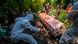Gravediggers work during a funeral at the San Isidro cemetery in Azcapotzalco, in Mexico City Gravediggers work during a funeral at the San Isidro cemetery in Azcapotzalco, in Mexico City