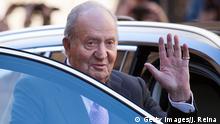 Former King Juan Carlos I of Spain waves as he leaves after attending the traditional Easter Sunday Mass of Resurrection in Palma de Mallorca on April 1, 2018. (Photo by JAIME REINA / AFP) (Photo by JAIME REINA/AFP via Getty Images)