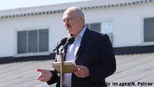 Belarus' President Alexander Lukashenko addresses employees of the Minsk Wheel Tractor Plant (MZKT), in Minsk, on August 17, 2020. - The Belarusian strongman, who has ruled his ex-Soviet country with an iron grip since 1994, is under increasing pressure from the streets and abroad over his claim to have won re-election on August 9, with 80 percent of the vote. Lukashenko met with workers at the plant and downplayed the protests, saying that in general factories were working. (Photo by Nikolay PETROV / BELTA / AFP) (Photo by NIKOLAY PETROV/BELTA/AFP via Getty Images)