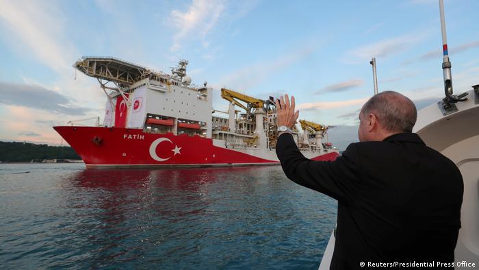Recep Tayyip Erdogan waves goodbye to a oil drilling ship bearing the Turkish flag (Reuters/Presidential Press Office)