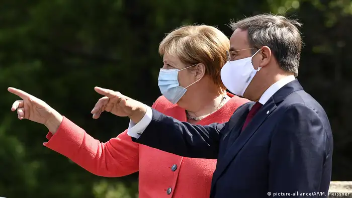 BG I Wie mit Fotos Politik gemacht wird I Virus Outbreak Germany Merkel