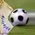 A football rolling towards a fan of euro banknotes