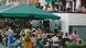A large number of people enjoy an outdoor beer garden in Cologne, Germany A large number of people enjoy an outdoor beer garden in Cologne, Germany