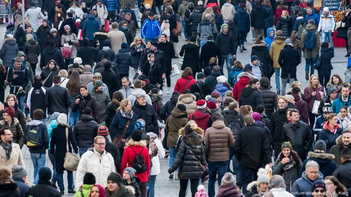 Crowds of people on a street