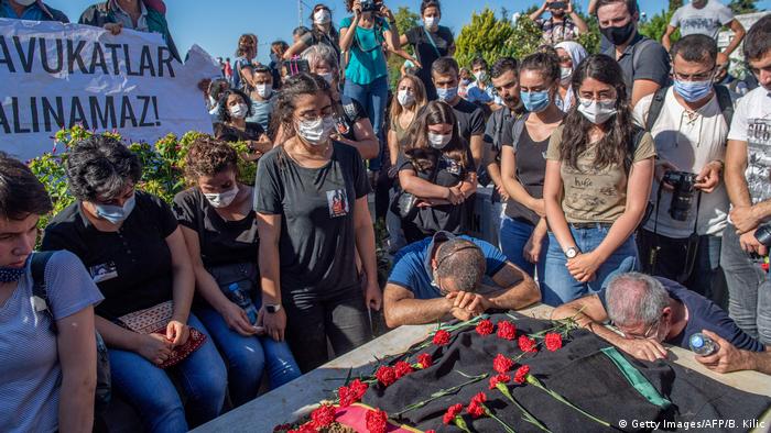 Relatives and friends mourn during the funeral of Turkish lawyer Ebru Timtik in the Gazi District of Istanbul on August 28, 2020.