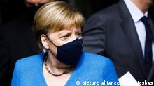 BERLIN, GERMANY - AUGUST 28: German Chancellor Angela Merkel wears a protective face mask as she leaves after speaking to the media for her annual summer press conference during the coronavirus pandemic on August 28, 2020 in Berlin, Germany. Abdulhamid Hosbas / Anadolu Agency | Keine Weitergabe an Wiederverkäufer.