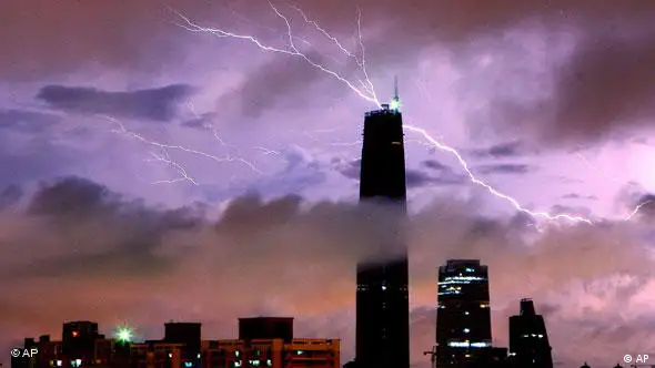 In this photo taken Wednesday, June 3, 2009, lightning strikes over Guangzhou International Finance Center during a rainstorm in Guangzhou, south China's Guangdong province. (AP Photo) ** CHINA OUT **