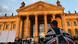 A protester in front of the German parliament building A protester in front of the German parliament building