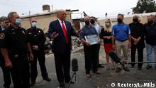 01.09.2020
U.S. President Donald Trump speaks while viewing property damage during a visit in the aftermath of recent protests against police brutality and racial injustice after the shooting of Jacob Blake by a police officer in Kenosha, Wisconsin, U.S., September 1, 2020. REUTERS/Leah Millis