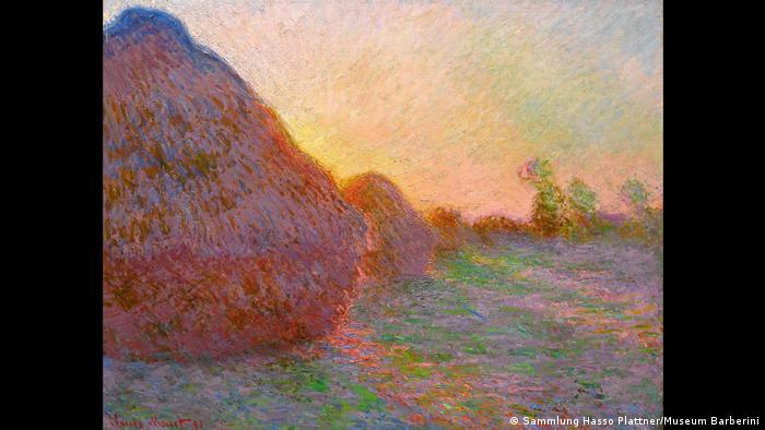 Claude Monets Getreideschober aus der Sammlung Hasso Plattner zeigt eine Reihe von Getreidehaufen im rotgelben Abendlicht. (Sammlung Hasso Plattner/Museum Barberini)
