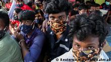 Rohingya refugees wearing protective face masks are pictured in Lhokseumawe, Aceh province, Indonesia September 7, 2020, in this photo taken by Antara Foto/Rahmad/via Reuters ATTENTION EDITORS - THIS IMAGE WAS PROVIDED BY THIRD PARTY. MANDATORY CREDIT. INDONESIA OUT.