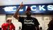 An Economic Freedom Fighters (EFF) supporter gestures during a picket outside the Clicks store in Sandton, South Africa, on September 7, 2020. An Economic Freedom Fighters (EFF) supporter gestures during a picket outside the Clicks store in Sandton, South Africa, on September 7, 2020.