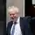 Boris Johnson waving in front of No 10