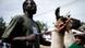 Afrikanischer Delegierte mit Lama, Foto: ap Afrikanischer Delegierte mit Lama, Foto: ap