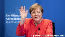 08.09.2020, Berlin: Bundeskanzlerin Angela Merkel (CDU) winkt im Kanzleramt zu Beginn einer virtuellen Konferenz mit Vertretern des Öffentlichen Gesundheitsdienstes zur Corona-Pandemie. Foto: Michael Sohn/AP/Pool/dpa +++ dpa-Bildfunk +++ | Verwendung weltweit