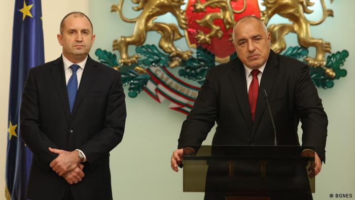 Bulgaria's President Ramen Radev (L) and former PM Boyko Borisov give a press conference