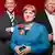 Восковые фигуры Меркель и политиков-мужчин в берлинском музее мадам Тюссо