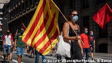Pro-independence Catalans rally on annual holiday, despite pandemic