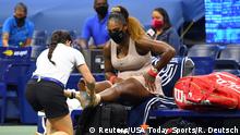 Sep 10, 2020; Flushing Meadows, New York, USA; Serena Williams of the United States gets treatment for her left ankle during the match against Victoria Azarenka of Belarus in the women's singles semifinals match on day eleven of the 2020 U.S. Open tennis tournament at USTA Billie Jean King National Tennis Center. Mandatory Credit: Robert Deutsch-USA TODAY Sports