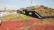 A Dusseldorf parking garage with a green roof A Dusseldorf parking garage with a green roof