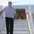 Лукашенко спускается по трапу самолета