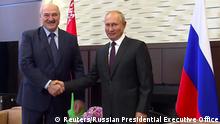 14.09.2020
Russia's President Vladimir Putin shakes hands with his Belarusian counterpart Alexander Lukashenko during a meeting in Sochi, Russia September 14, 2020, in this still image taken from a video. Russian Presidential Executive Office/Handout via REUTERS ATTENTION EDITORS - THIS IMAGE WAS PROVIDED BY A THIRD PARTY. NO RESALES. NO ARCHIVES.