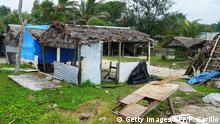 Badly damaged buildings are pictured near Vanuatu's capital of Port Vila on April 7, 2020, after Tropical Cyclone Harold swept past and hit islands to the north. - The deadly cyclone destroyed much of Vanuatu's second-largest town Luganville, 275 kms (170 miles) north of Port Villa, but early warnings appeared to have prevented mass casualties in the Pacific nation, with some residents sheltered in caves to stay safe, aid workers said on April 7. (Photo by PHILIPPE CARILLO / AFP) (Photo by PHILIPPE CARILLO/AFP via Getty Images)
